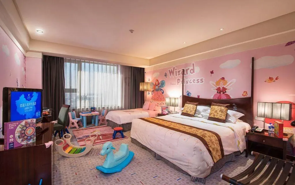 Bed in Grand New Century Hotel Binhai Tianjin