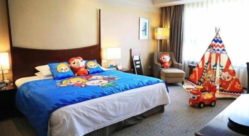 Bed in Grand New Century Hotel Binhai Tianjin