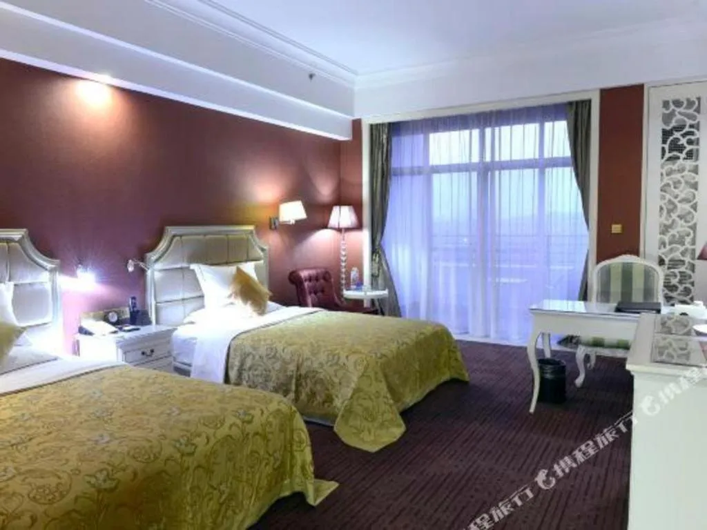 Bed in Country Garden Phoenix Hotel Changsha