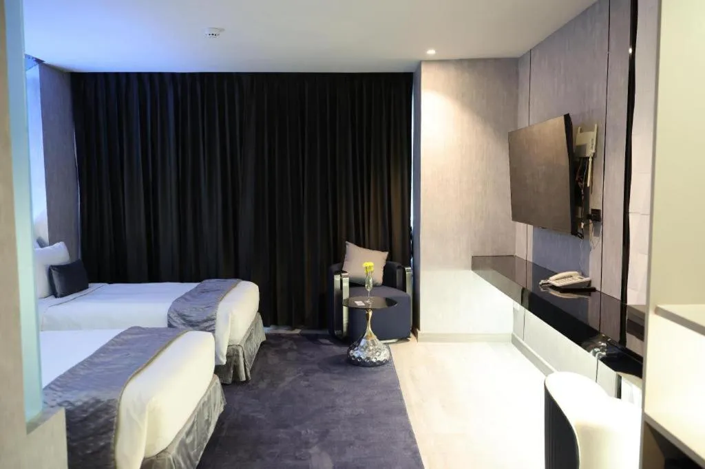 Bed in Glacier Hotel Khon Kaen