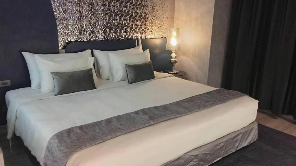 Bed in Glacier Hotel Khon Kaen