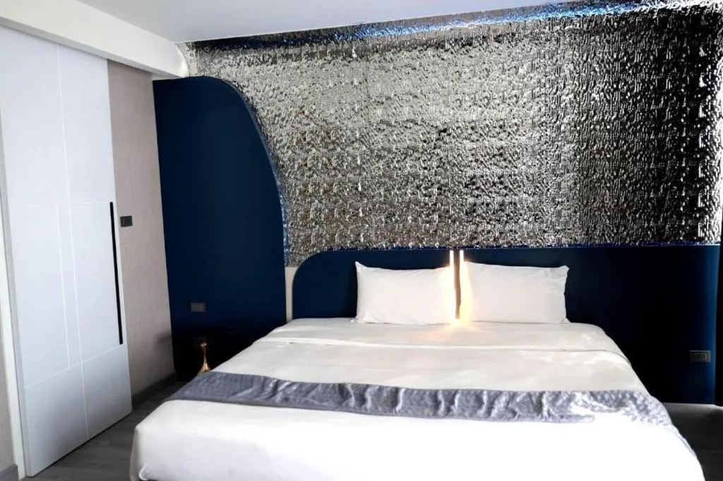 Bed in Glacier Hotel Khon Kaen