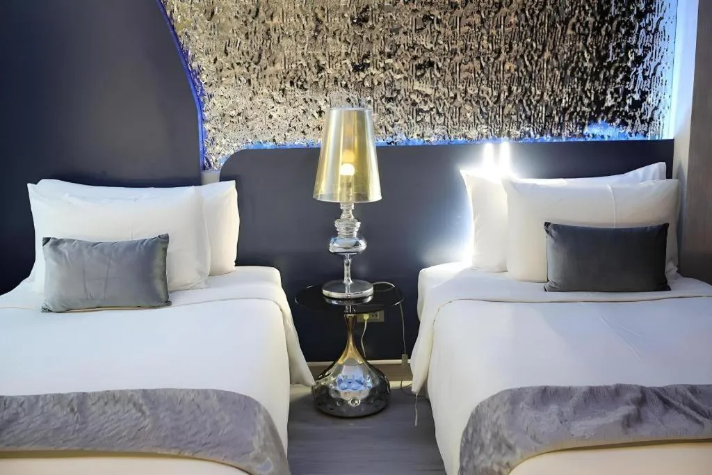 Bed in Glacier Hotel Khon Kaen