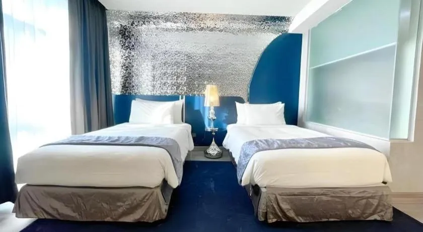 Bed in Glacier Hotel Khon Kaen