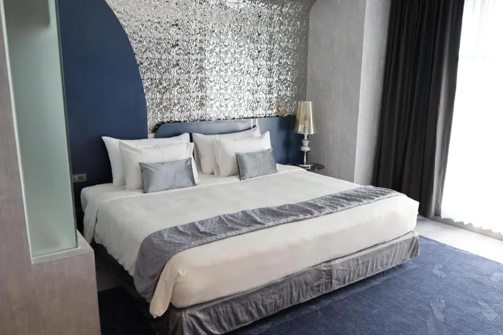 Bed in Glacier Hotel Khon Kaen