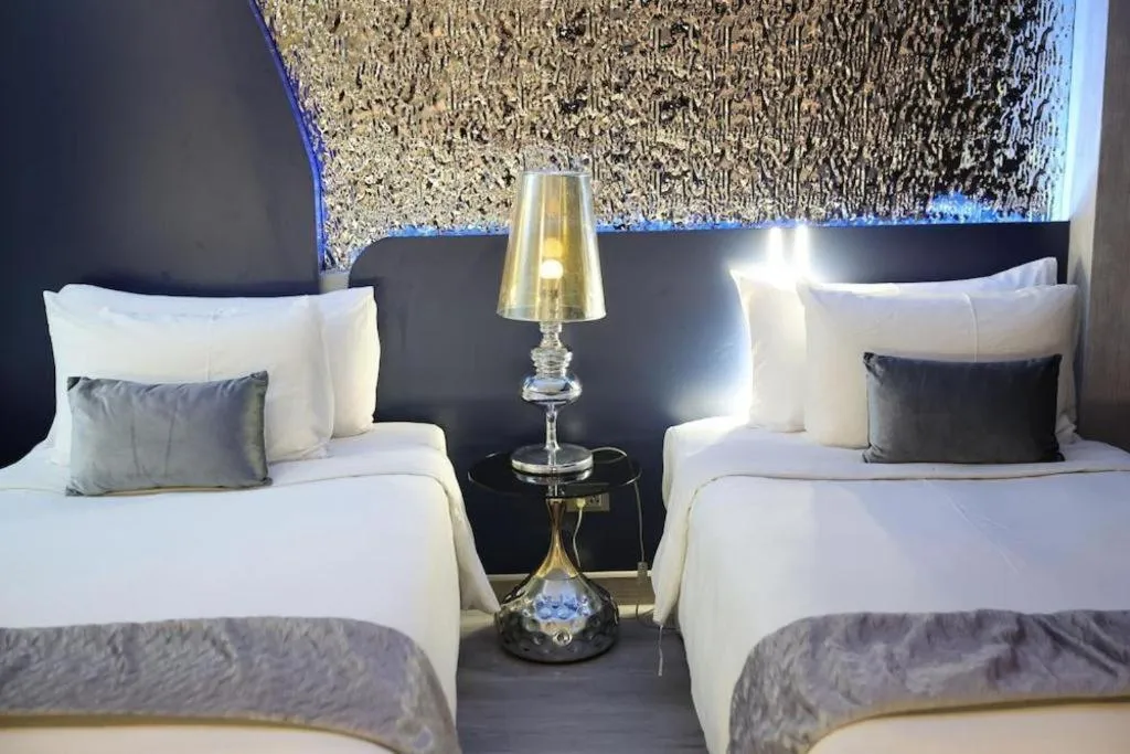 Bed in Glacier Hotel Khon Kaen