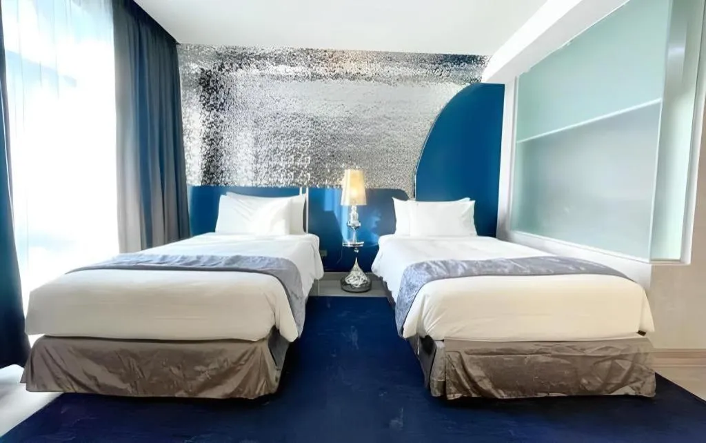 Bed in Glacier Hotel Khon Kaen