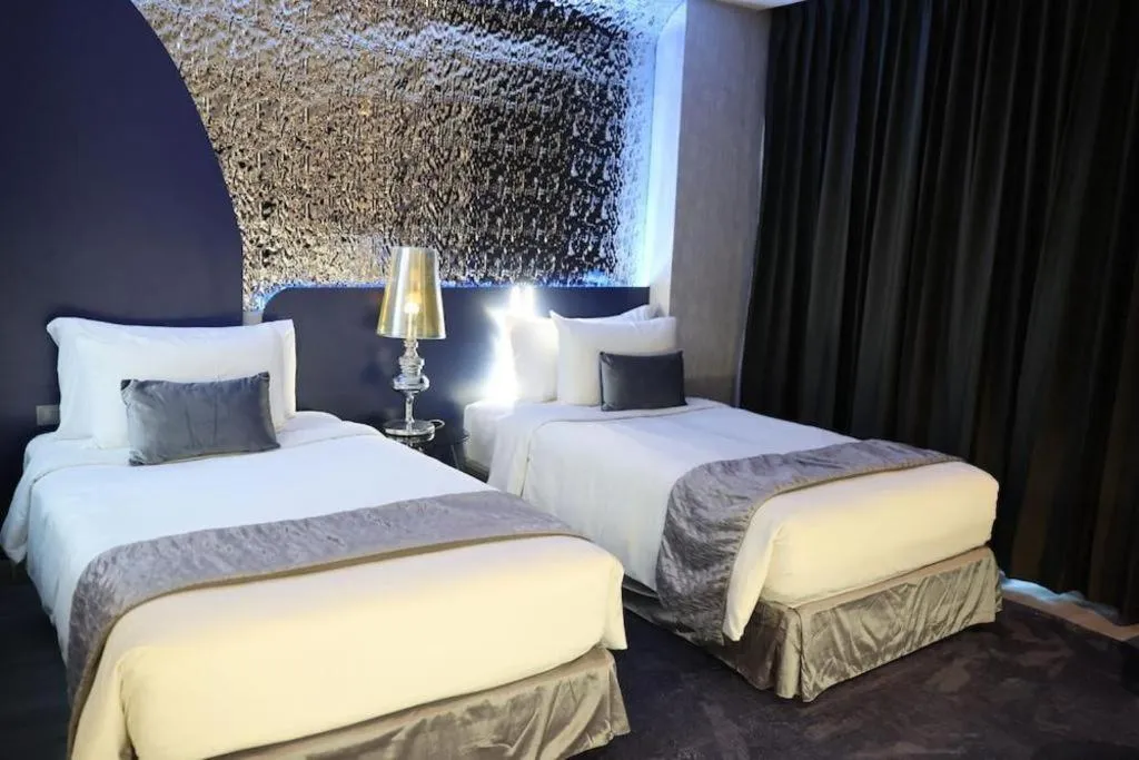 Bed in Glacier Hotel Khon Kaen