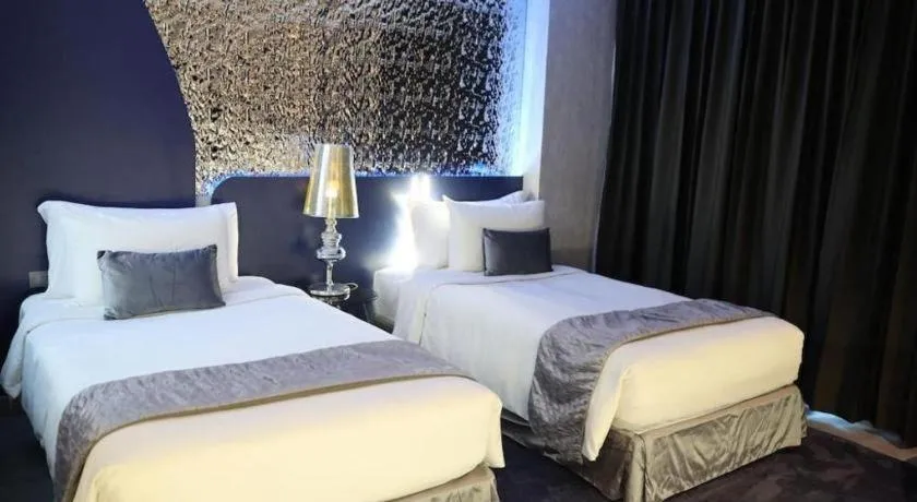 Bed in Glacier Hotel Khon Kaen