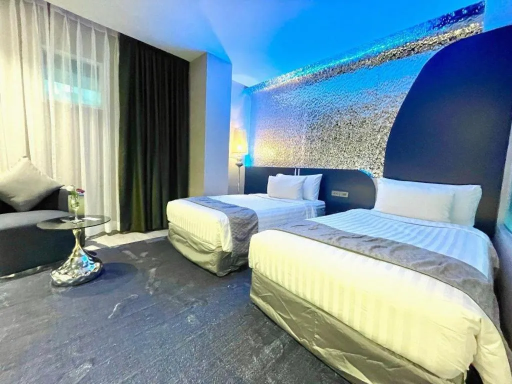 Bed in Glacier Hotel Khon Kaen