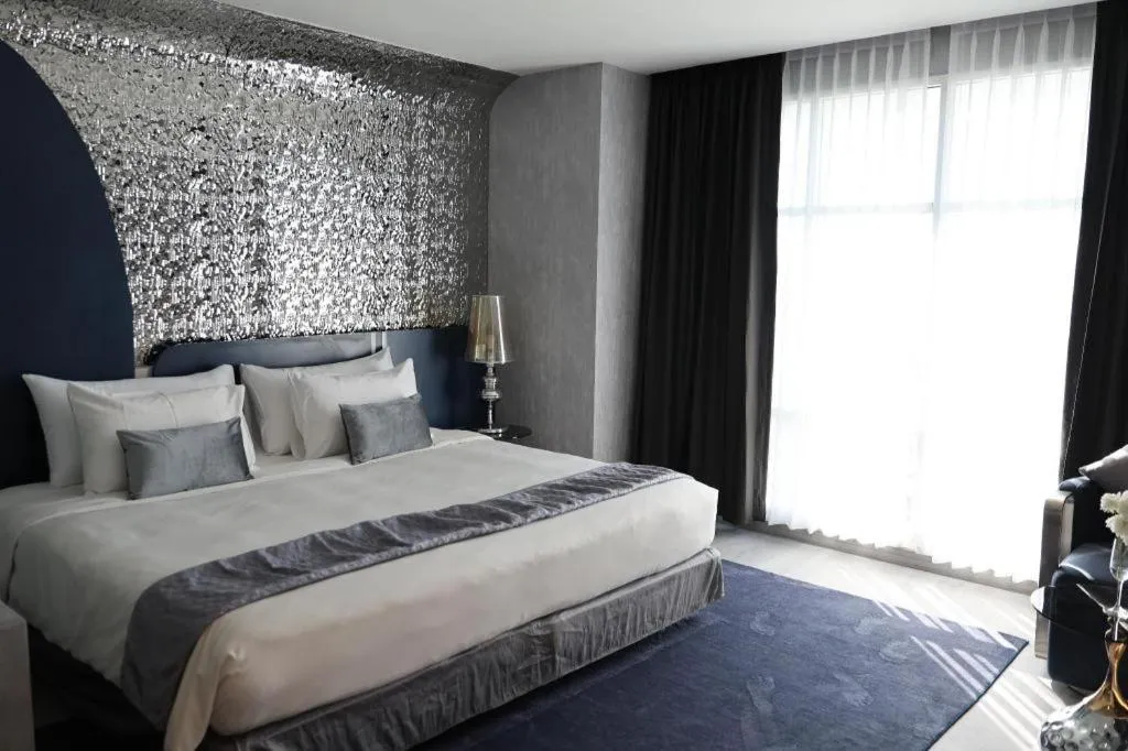 Bed in Glacier Hotel Khon Kaen