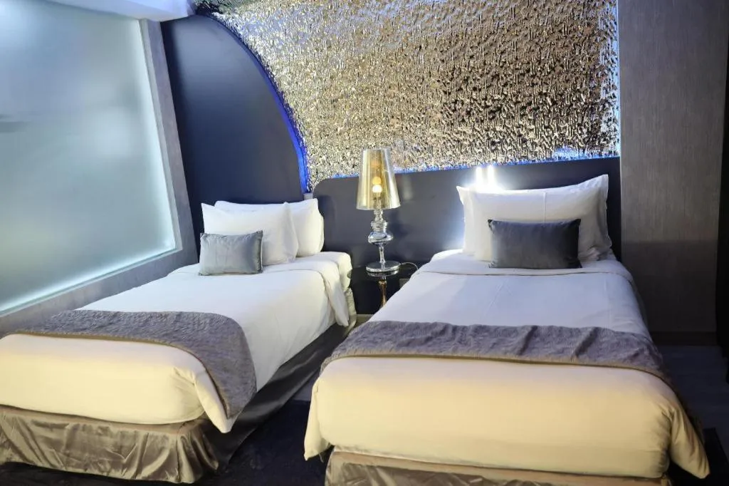 Bed in Glacier Hotel Khon Kaen