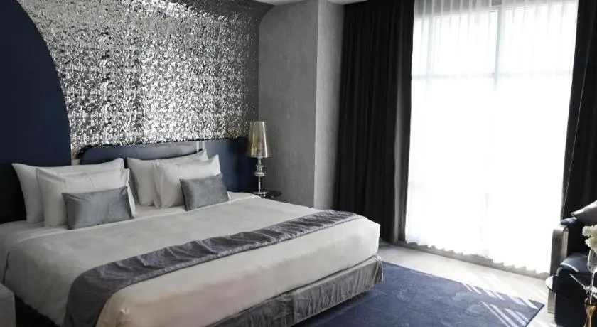 Bed in Glacier Hotel Khon Kaen