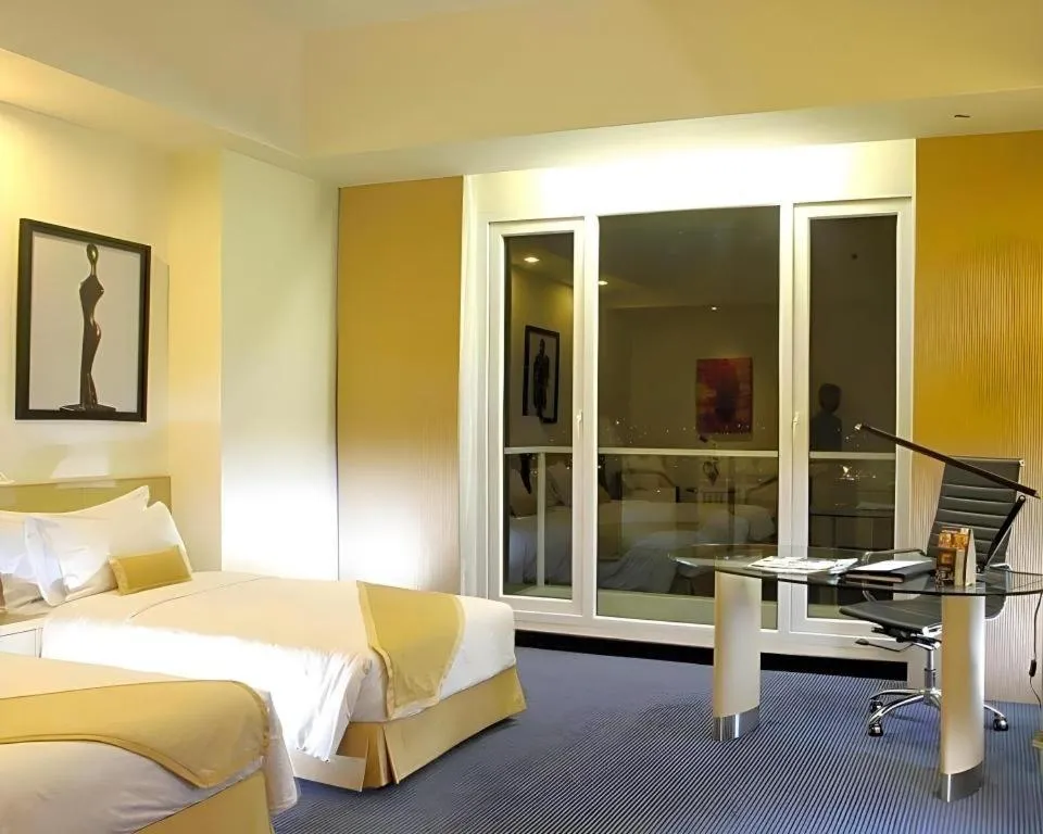 Bed in Sintesa Peninsula Hotel