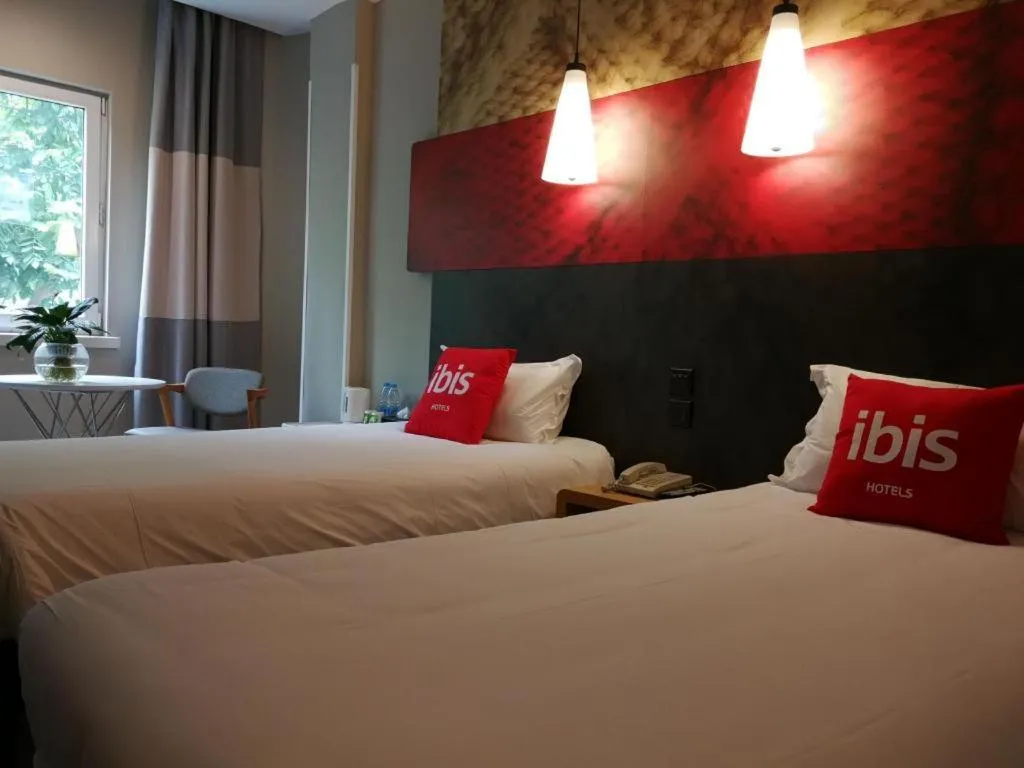 Bed in Ibis Xiamen Railway Station Hotel