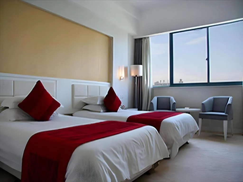 Bed in Ramada Plaza by Wyndham Hangzhou Riverside
