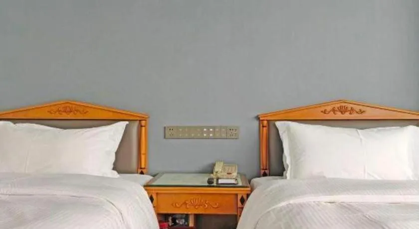 Bed in Wuhan Asia Hotel