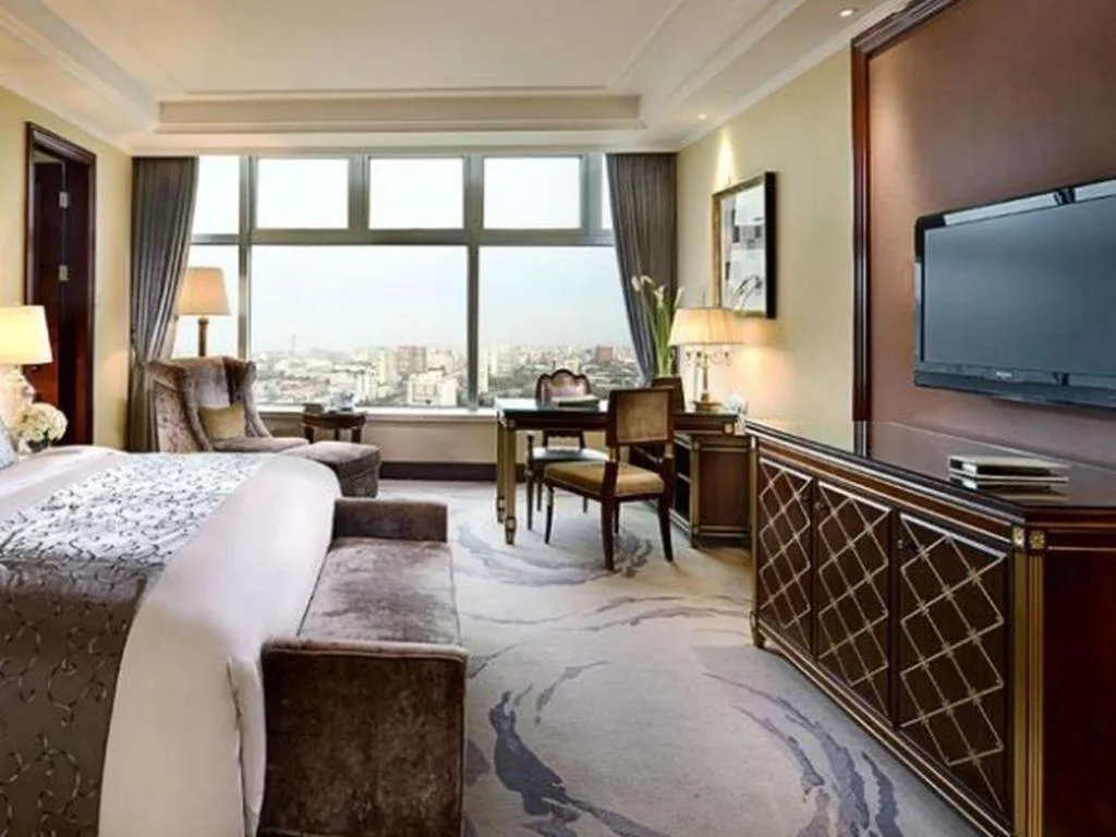 Bed in Beijing Liaoning Hotel