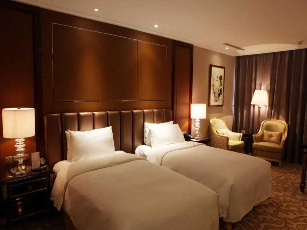 Bed in Beijing Liaoning Hotel