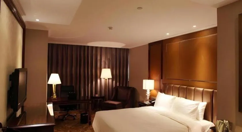 Bed in Beijing Liaoning Hotel