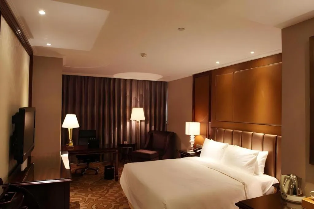 Bed in Beijing Liaoning Hotel