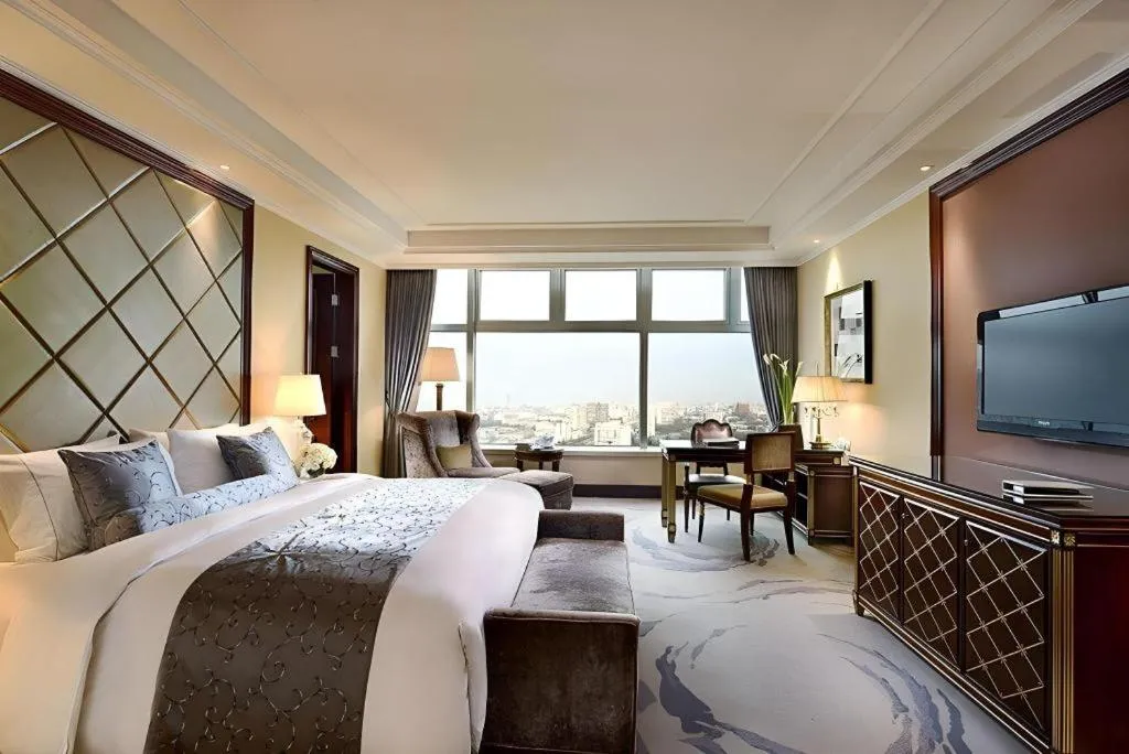 Bed in Beijing Liaoning Hotel