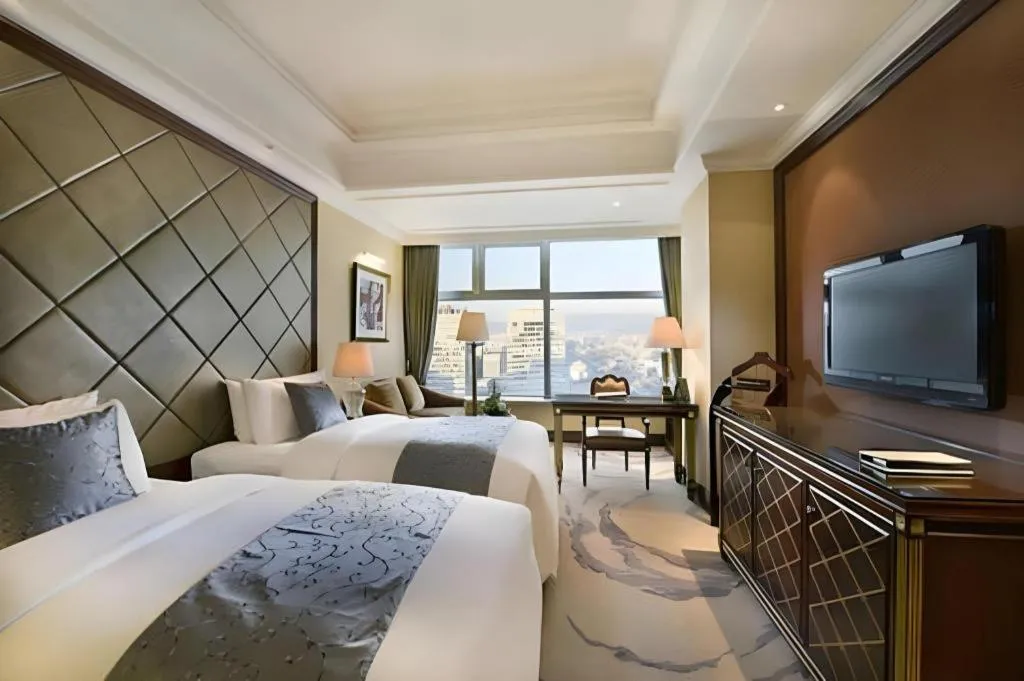 Bed in Beijing Liaoning Hotel