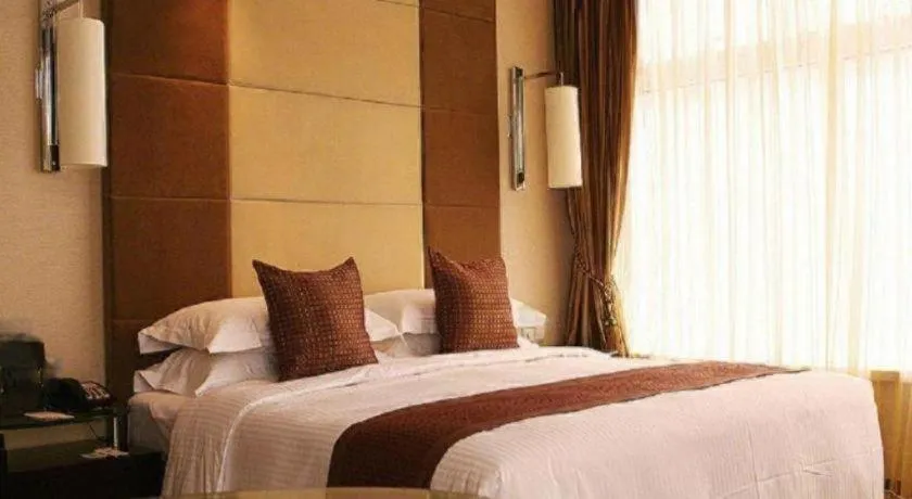 Bed in Beijing Liaoning Hotel