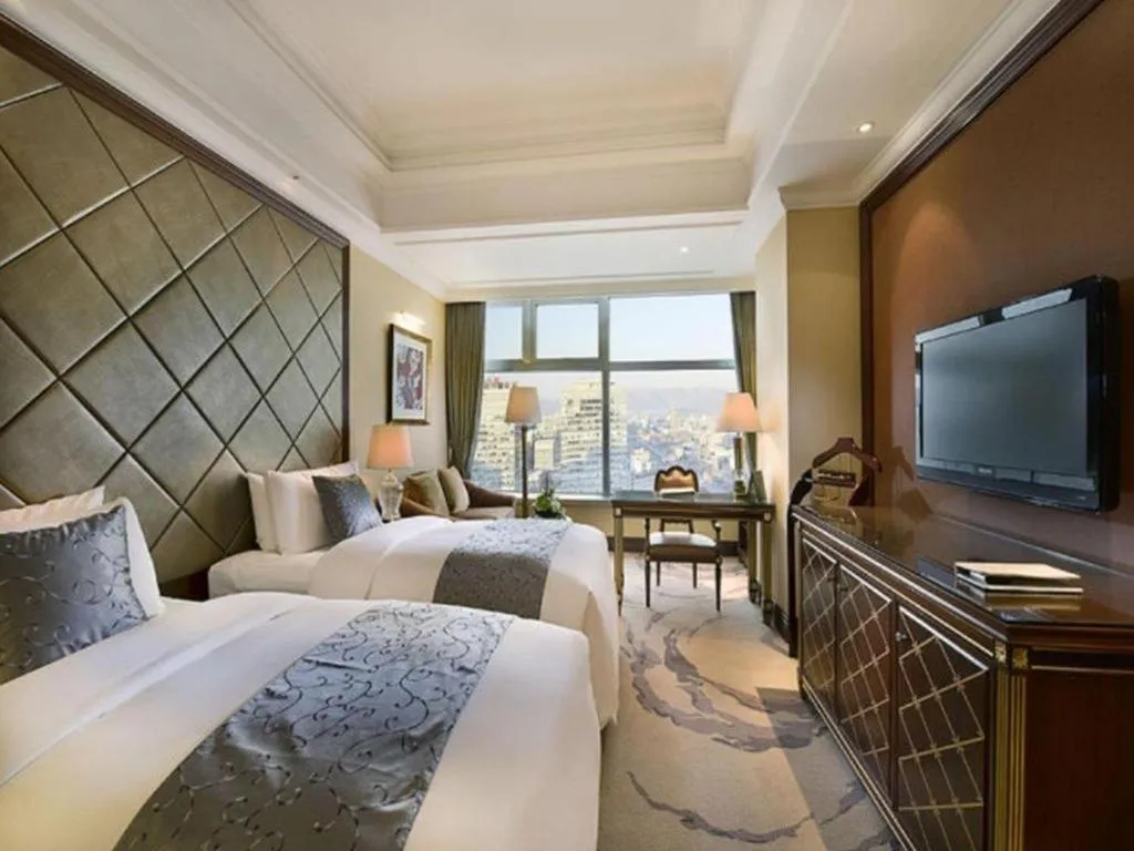 Bed in Beijing Liaoning Hotel