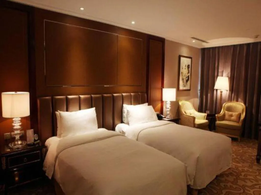 Bed in Beijing Liaoning Hotel