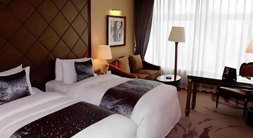 Bed in Beijing Liaoning Hotel