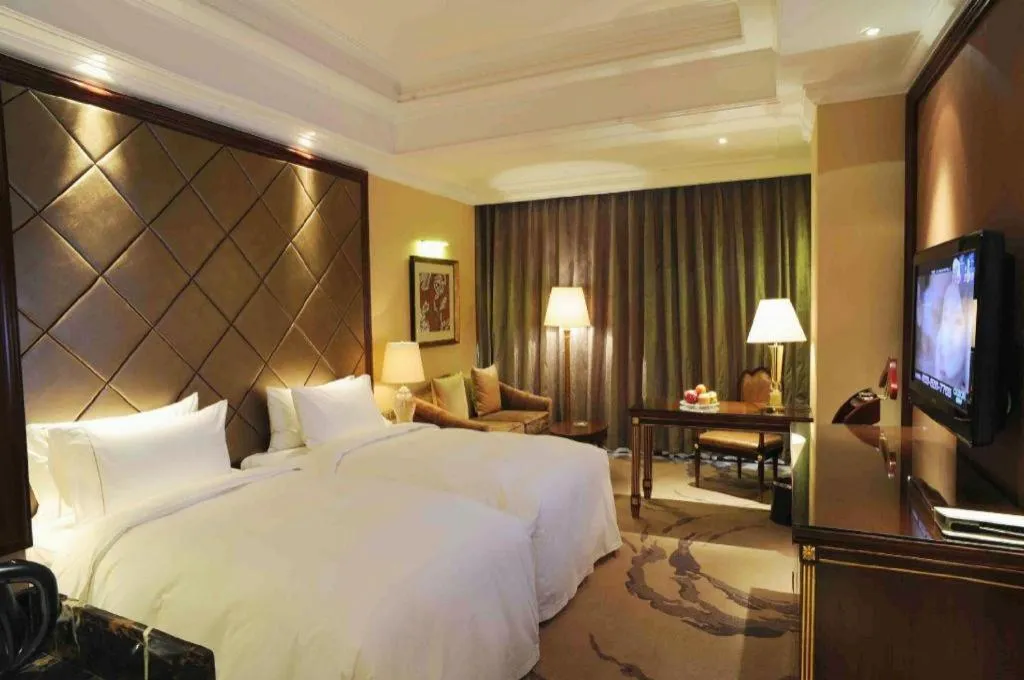 Bed in Beijing Liaoning Hotel