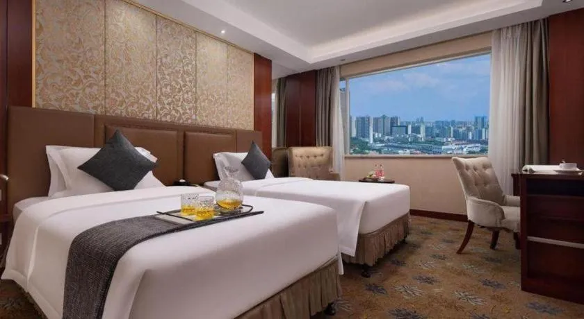 Bed in Changsha Huatian Hotel