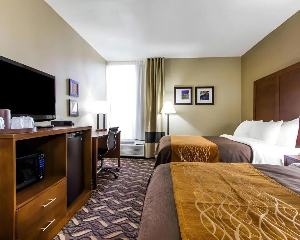 Bed in AmericInn by Wyndham Memphis East