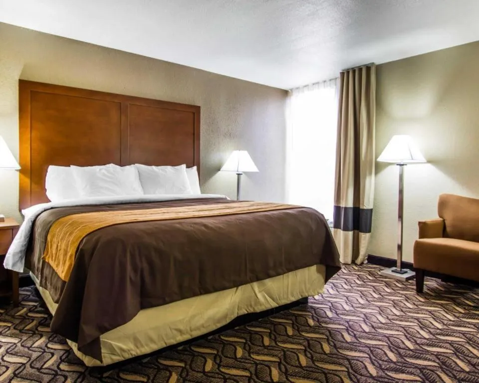 Bed in AmericInn by Wyndham Memphis East