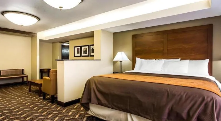 Bed in AmericInn by Wyndham Memphis East