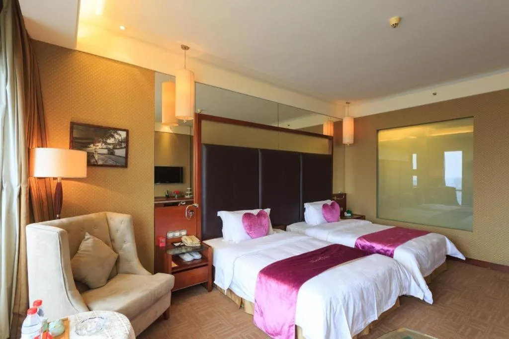 Bed in Changsha Xiaoxiang Huatian Hotel