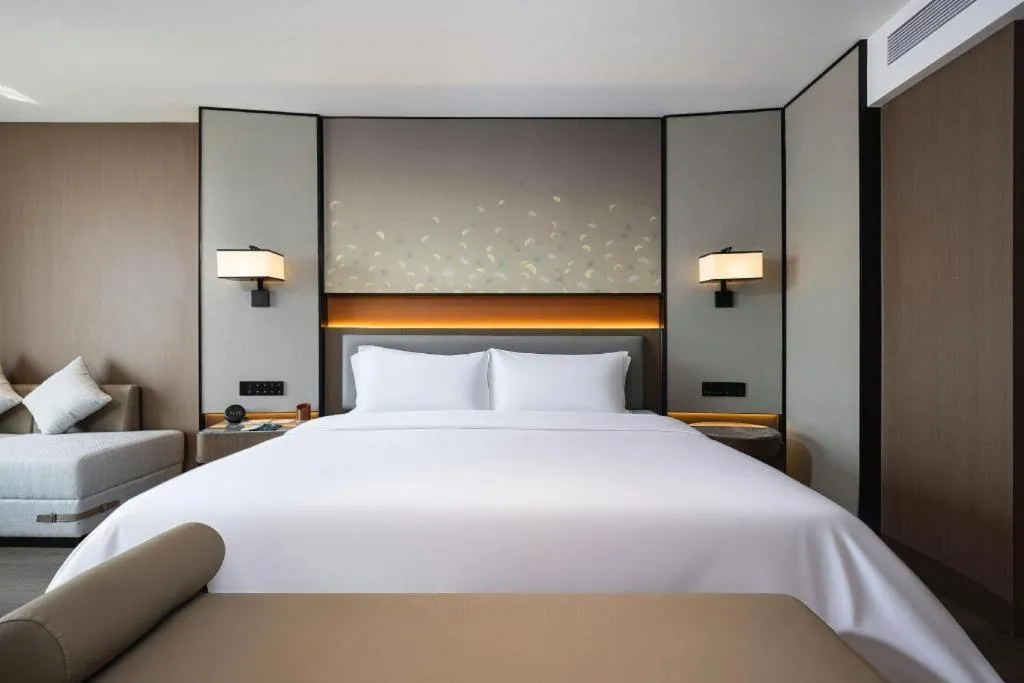 Bed in Changsha Xiaoxiang Huatian Hotel