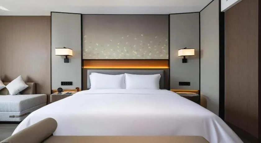 Bed in Changsha Xiaoxiang Huatian Hotel