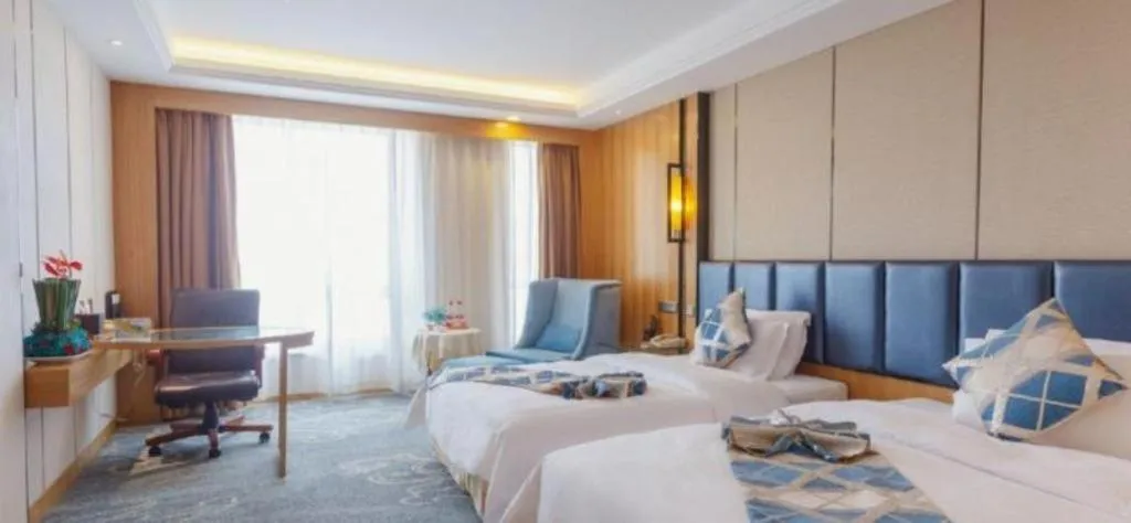 Bed in Changsha Xiaoxiang Huatian Hotel