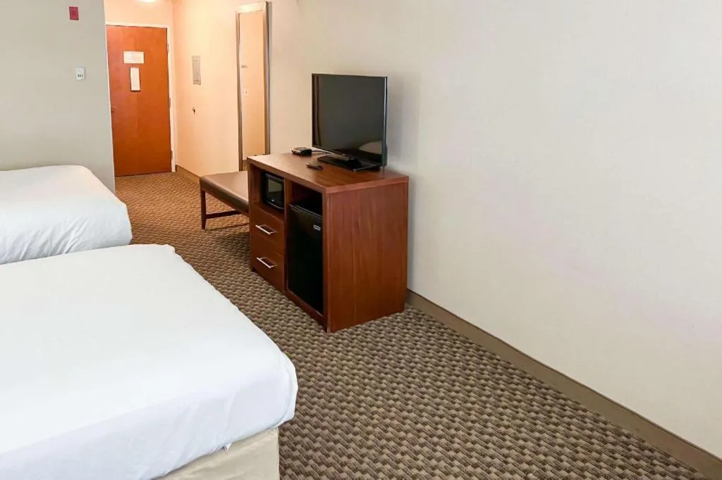 Bed in Comfort Inn and Suites Thatcher