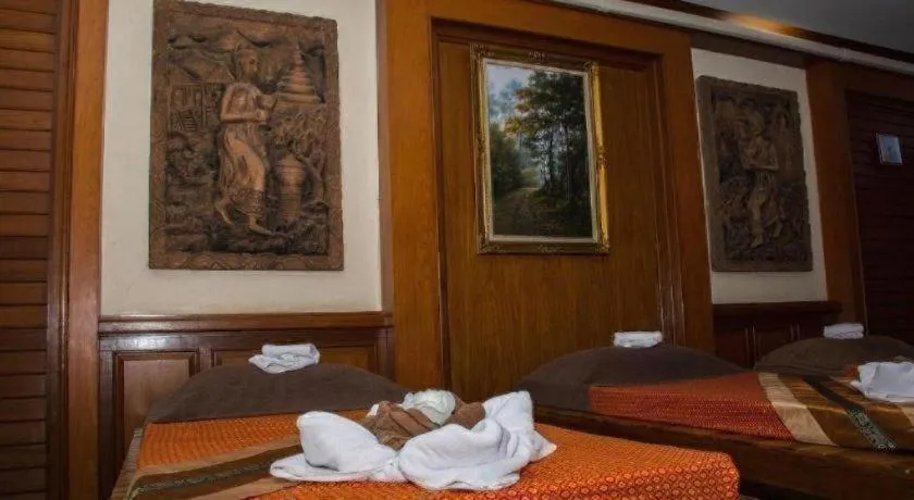 Bed in PhoomThai Garden Hotel