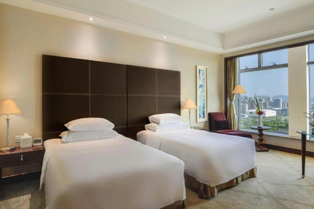 Bed in New Century Grand Hotel Zhuji Yaojiang