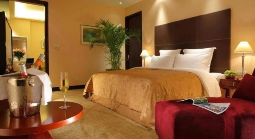 Bed in New Century Grand Hotel Zhuji Yaojiang