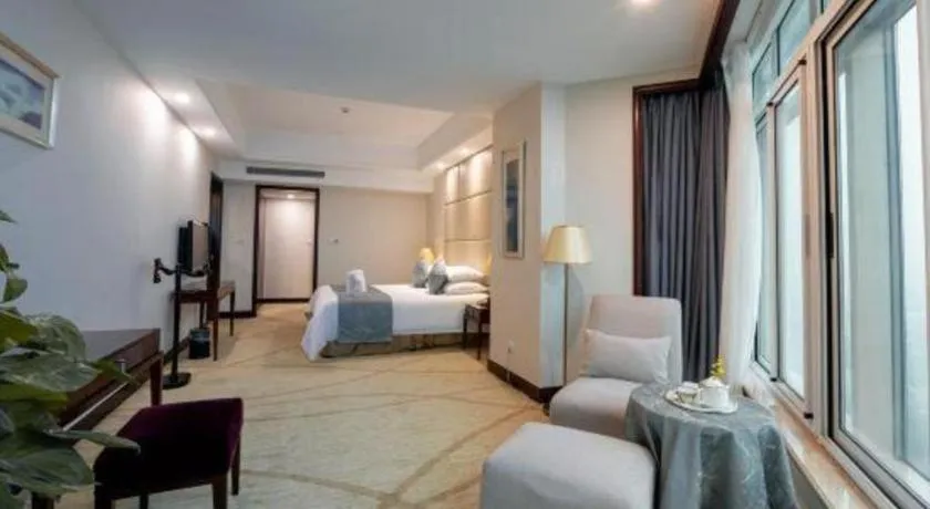 Bed in New Century Grand Hotel Zhuji Yaojiang