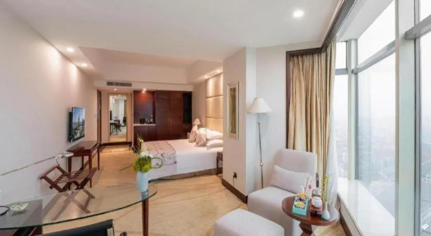 Bed in New Century Grand Hotel Zhuji Yaojiang