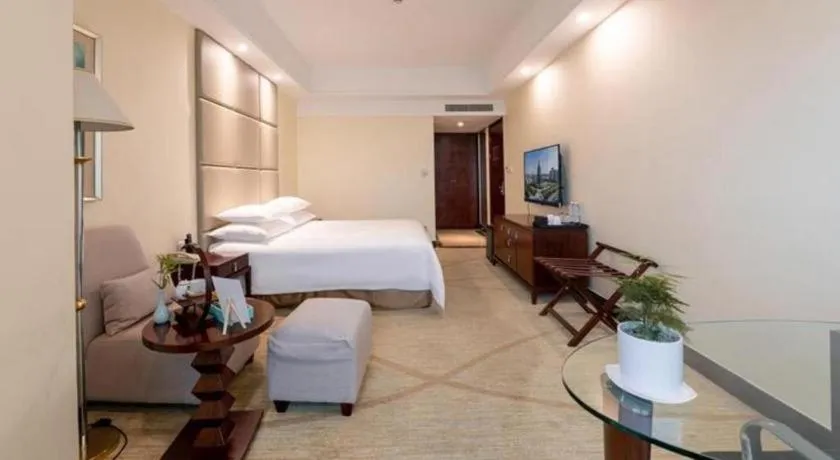 Bed in New Century Grand Hotel Zhuji Yaojiang