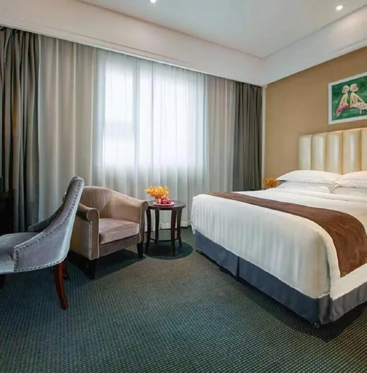 Bed in New Century Manju Hotel Shanghai New International Expo Center