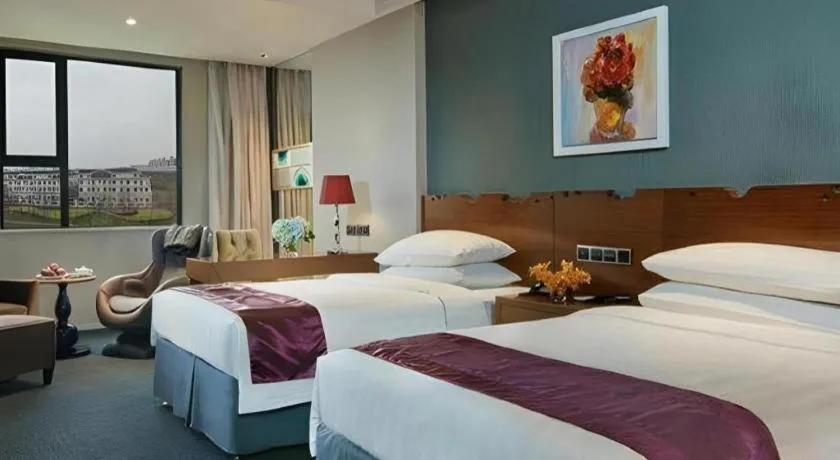 Bed in New Century Manju Hotel Shanghai New International Expo Center