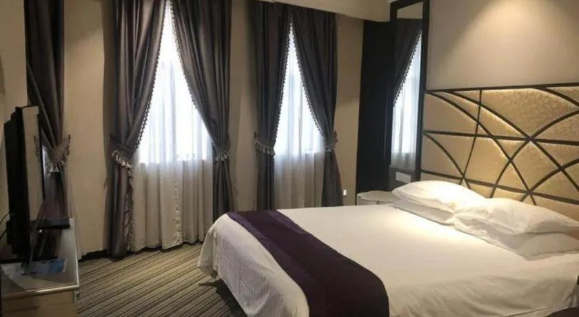 Bed in New Century Manju Hotel Shanghai New International Expo Center